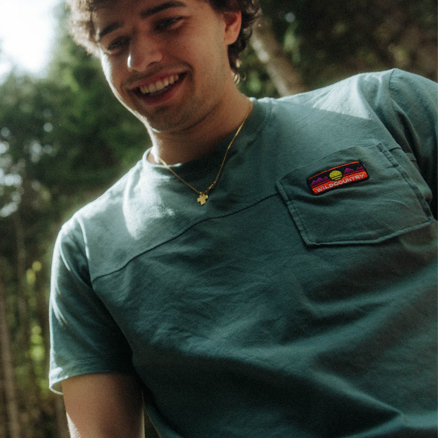 Wild Country Climbing Spotter T-Shirt Man Outdoor Action Marsh - Product In Use close up of logo