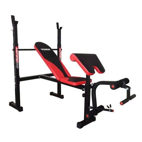 Red and black weight bench with attachments on a white background