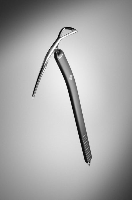 Black Diamond Raven Pro Ice Axe Outdoor Action- Slightly curved aluminum shaft with grooved grip