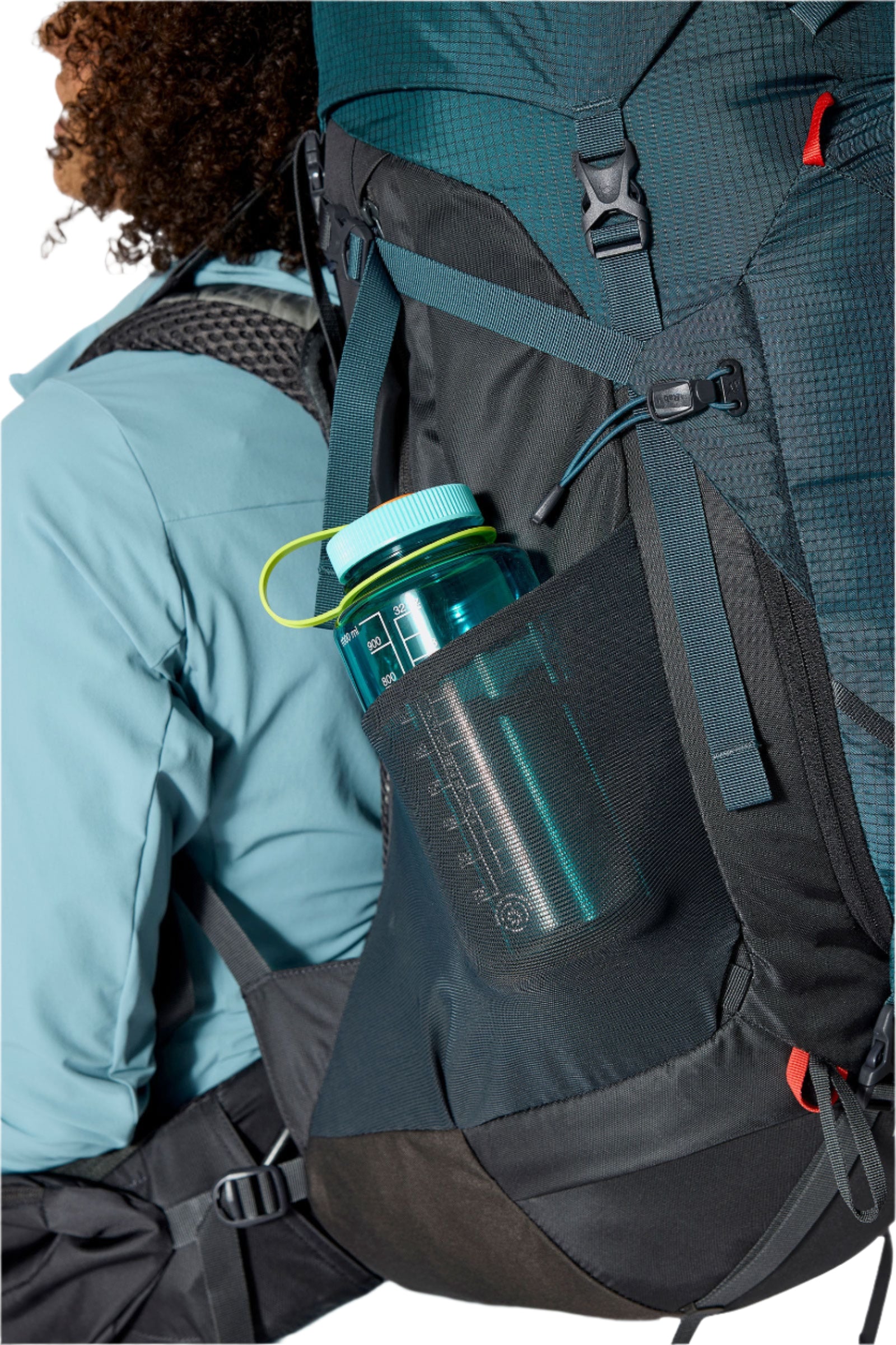 Rab Women's Hyperon ND65L Trekking Pack in Orion Blue/Anthracite - side stretch pocket with water bottle