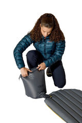 Rab Ionosphere 5 Sleep Mat in Dark Pollen - pump sack, worn, angle