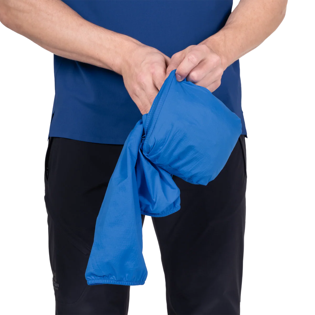 Adjustable hem drawcord detail on Mountain Equipment Aerofoil Hooded Men's Jacket in Atlantic Blue for use under a harness or rucksack waistbelt