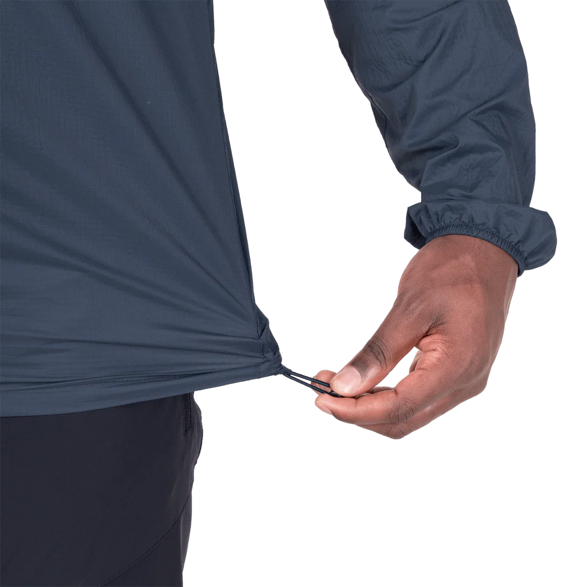 Zipped chest pocket detail on Mountain Equipment Aerofoil Hooded Men's Jacket in Blue Nights doubling as stuff sack with twin karabiner carry loops