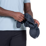 Mountain Equipment Aerofoil Hooded Men's Jacket in Blue Nights - packed into chest pocket showing twin karabiner carry loops