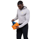 Mountain Equipment Aerotherm Men's Vest in Atlantic/Blue Nights - packed into hand pocket showing twin karabiner carry loops