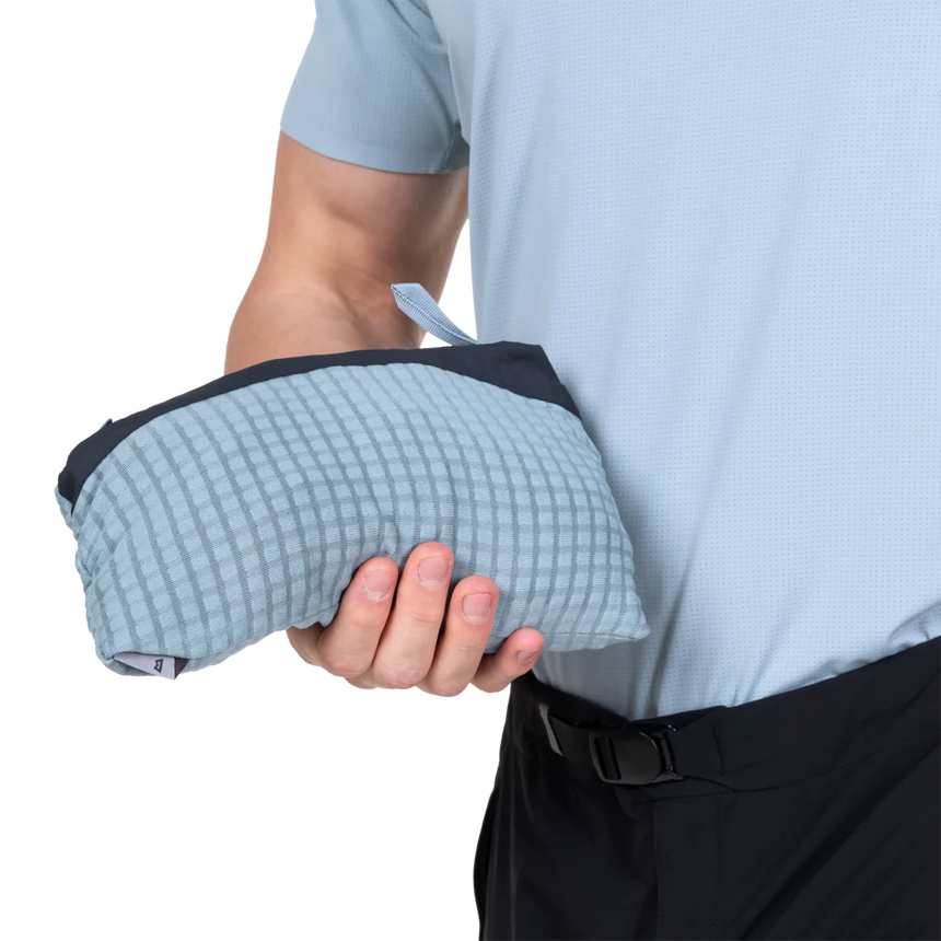 Semi-elasticated hem detail on Mountain Equipment Aerotherm Men's Vest in Blue Nights