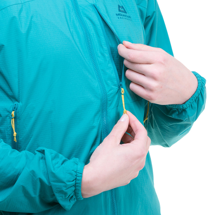 Zipped chest pocket detail on Mountain Equipment Aerotherm Women's Jacket in Jade doubling as stuff sack with twin karabiner carry loops