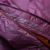 Mountain Equipment Classic Eco 300 Women's Sleeping Bag in Raisin packed into waterproof roll-top stuff sack