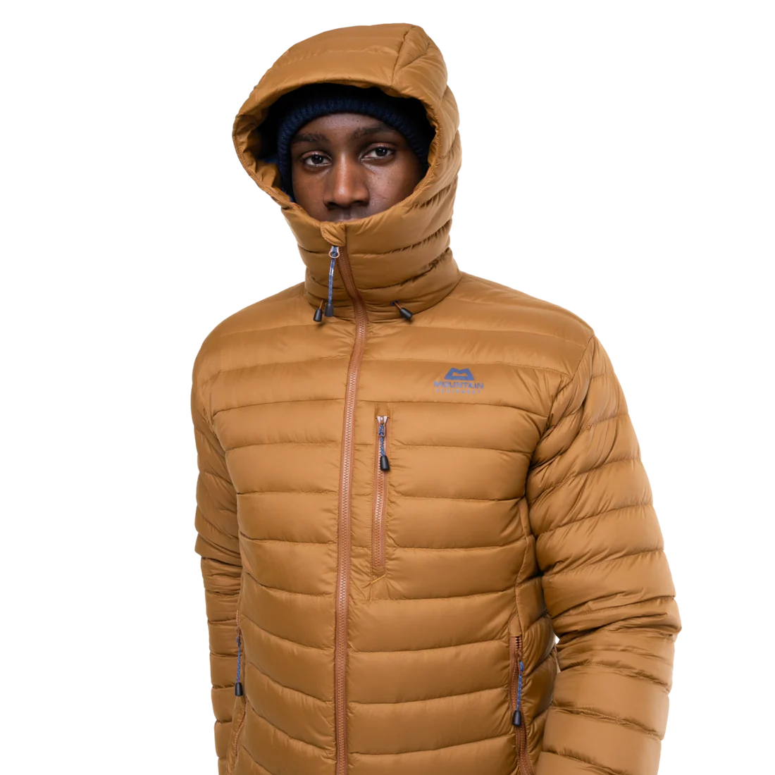 Mountain Equipment Earthrise Hooded Men's Jacket in Walnut packed into hand pocket showing twin karabiner carry loops