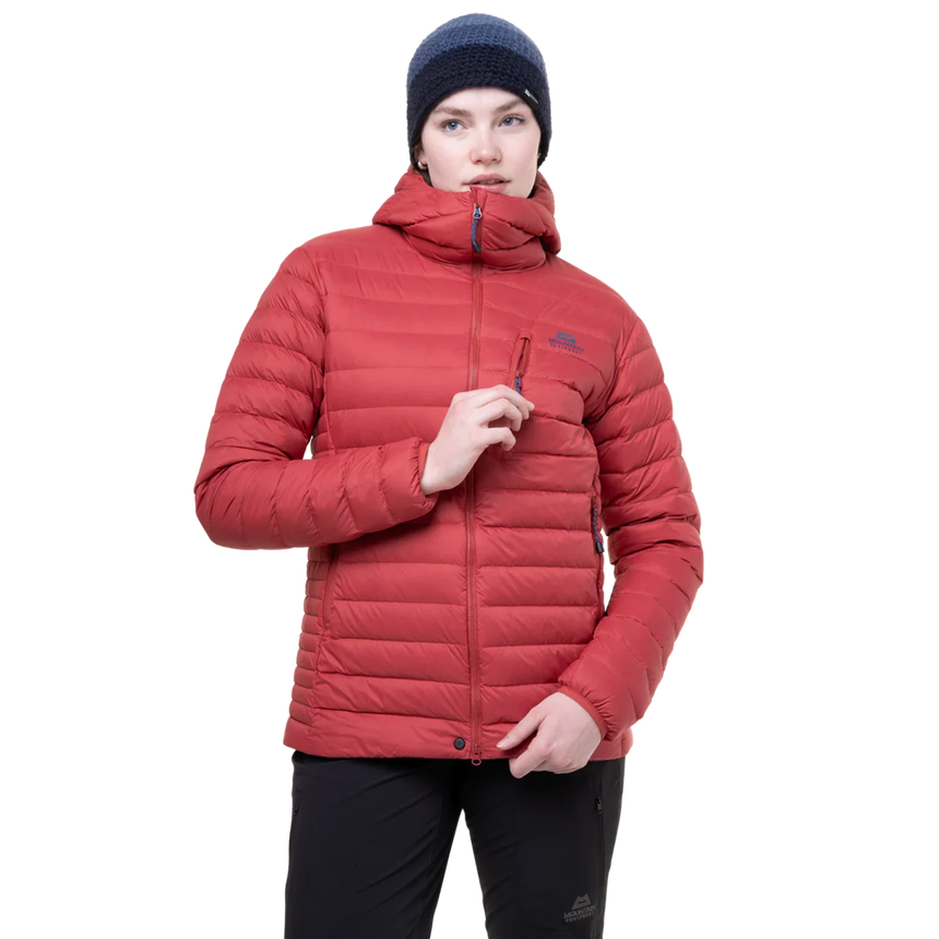 Mountain Equipment Earthrise Hooded Women's Jacket in Rosewood packed into hand pocket showing twin karabiner carry loops