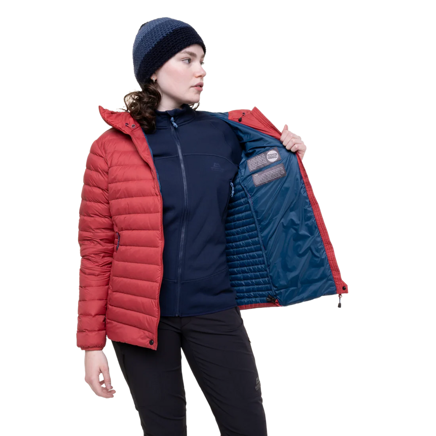 Mountain Equipment Earthrise Hooded Women's Jacket in Rosewood - lifestyle view showing lightweight recycled down insulation for ski touring and alpine climbing