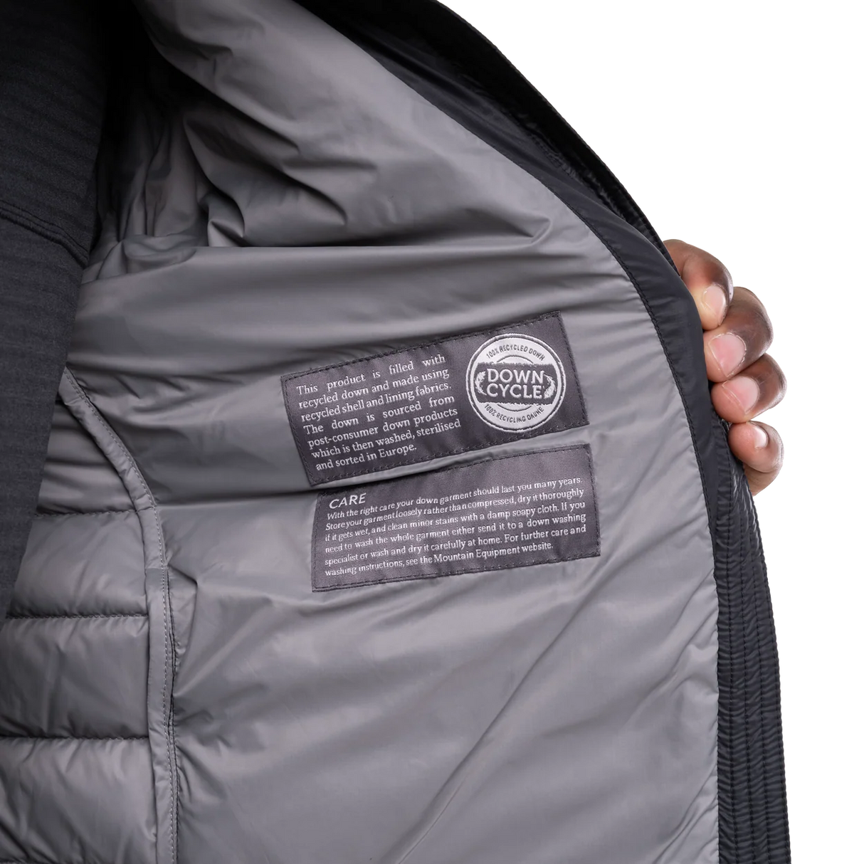 Mountain Equipment Earthrise Men's Jacket in Black - lifestyle view showing lightweight recycled down insulation for ski touring and alpine climbing