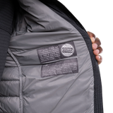 Mountain Equipment Earthrise Men's Jacket in Black - lifestyle view showing lightweight recycled down insulation for ski touring and alpine climbing