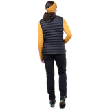 Mountain Equipment Earthrise Women's Vest in Black packed into hand pocket showing twin karabiner carry loops