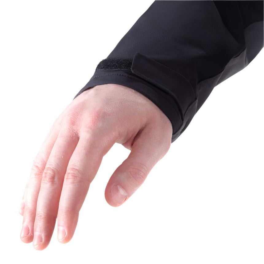 Zipped hand pocket detail on Mountain Equipment Frontier Men's Jacket in Anvil Grey/Black positioned high for harness compatibility