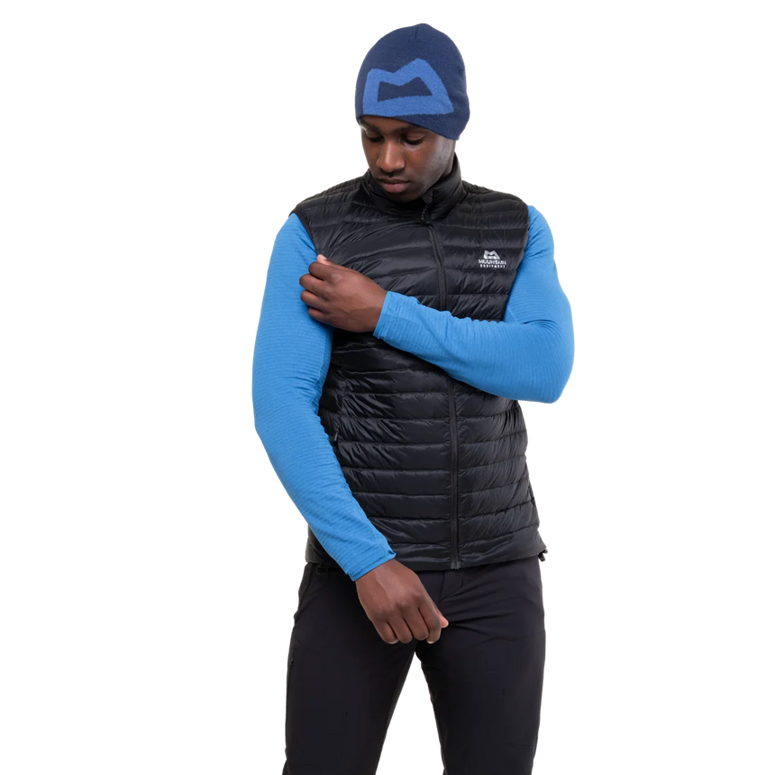 Mountain Equipment Frostline Men's Vest in Black worn on model showing elastane-bound armhole detail
