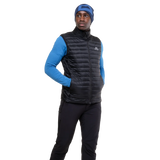 Mountain Equipment Frostline Men's Vest in Black worn on model - angled front view showing DRILITE Loft 20D shell and stitch-through narrow baffles