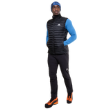 Mountain Equipment Frostline Men's Vest in Black worn on model - full length angled front view showing lightweight packable down vest for year-round layering