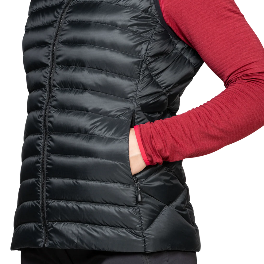 Zipped hand warmer pocket detail on Mountain Equipment Frostline Women's Vest in Black showing YKK zip and pack-away pocket with karabiner loops