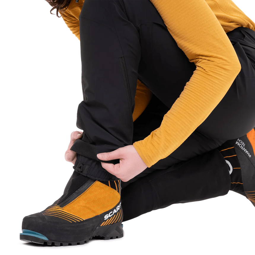 Ankle zip with internal gusset panel on Mountain Equipment G2 Mountain Women's Pant in Black for mountain boots