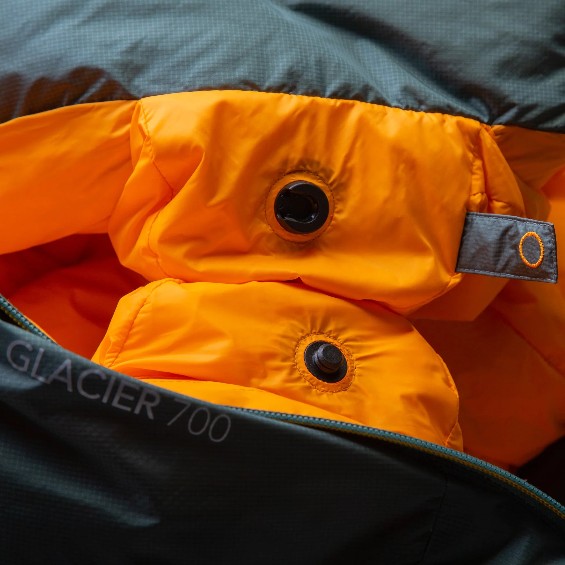5-baffle hood with Lode Lock magnetic closure and collar drawcords detail on Mountain Equipment Glacier 450 Women's Sleeping Bag in Sage