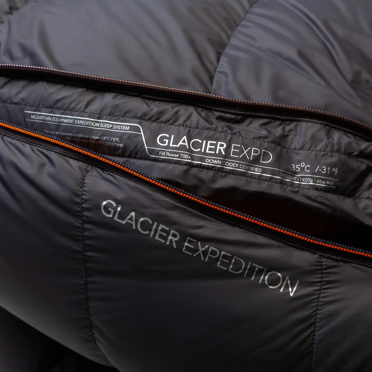 Full-length Gemini zip baffle detail on Mountain Equipment Glacier Expedition Sleeping Bag in Obsidian