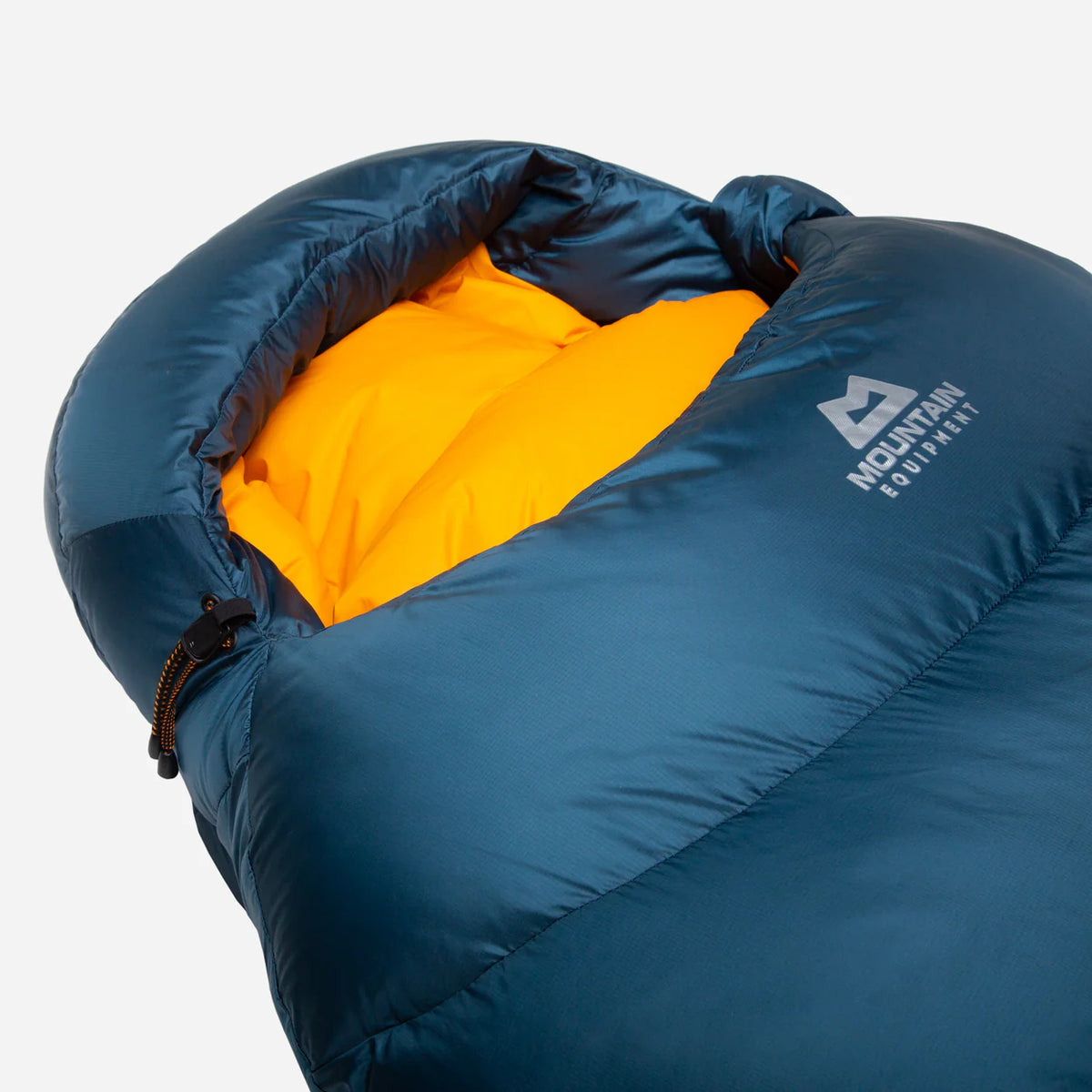 Gemini full-length entry zip baffle detail on Mountain Equipment Helium 400 Sleeping Bag in Majolica Blue with Lode Lock magnetic closure and integrated neck collar