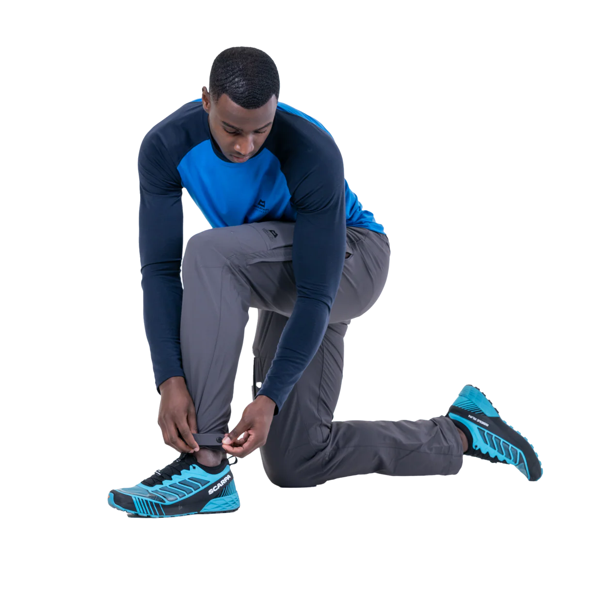 Adjustable waistband with metal button closure on Mountain Equipment Ibex Pro Men's Pant in Anvil Grey