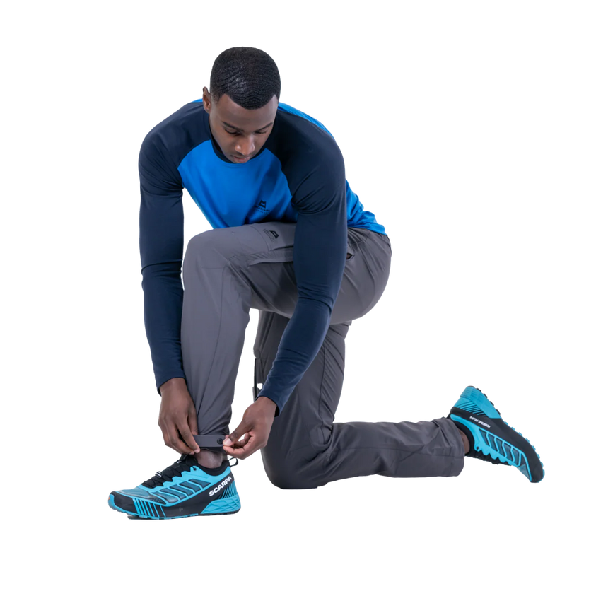 Adjustable waistband with metal button closure on Mountain Equipment Ibex Pro Men's Pant in Anvil Grey