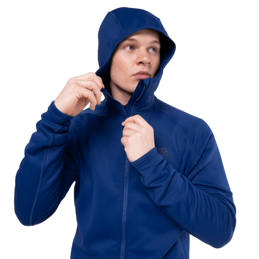 Mountain Equipment Jorasses Hooded Men's Jacket in Admiral Blue - lifestyle view showing warm stretch fleece for mountaineering and skiing
