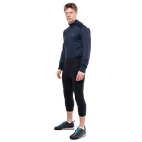 Mountain Equipment Jorasses Lite Men's 3/4 Tight in Black - lifestyle view showing fleece ski tight for cold mountain conditions