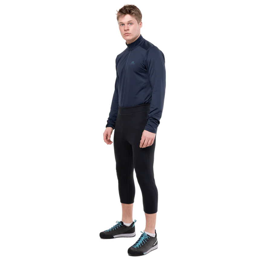 Mountain Equipment Jorasses Lite Men's 3/4 Tight in Black - lifestyle view showing fleece ski tight for cold mountain conditions