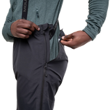 Mountain Equipment Karakoram Mountain Men's Pant in Black - left side view showing full-length two-way side zip