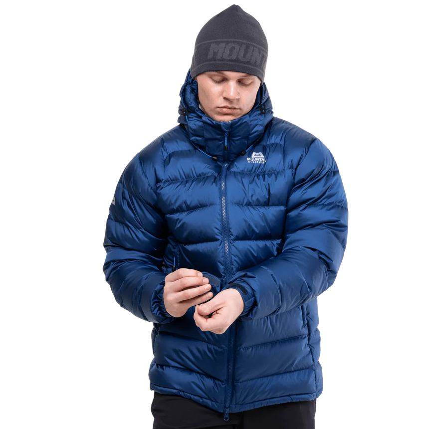Stitch-through baffle construction detail on Mountain Equipment Lightline Men's Jacket in Admiral Blue showing 700 fill power down insulation