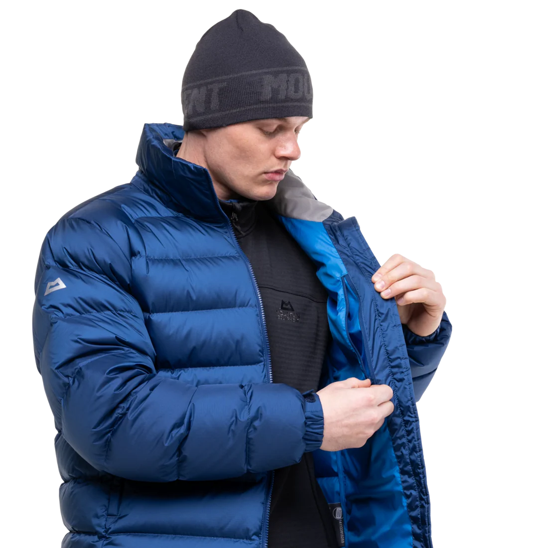 Mountain Equipment Lightline Men's Jacket in Admiral Blue packed into stuff sack showing lightweight packable construction