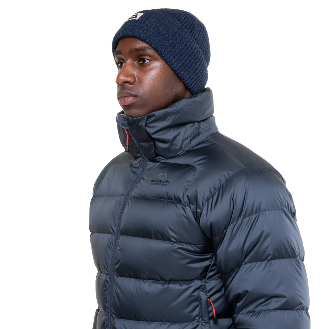 Stitch-through baffle construction detail on Mountain Equipment Lightline Men's Jacket in Blue Nights/Cosmos showing 700 fill power down insulation