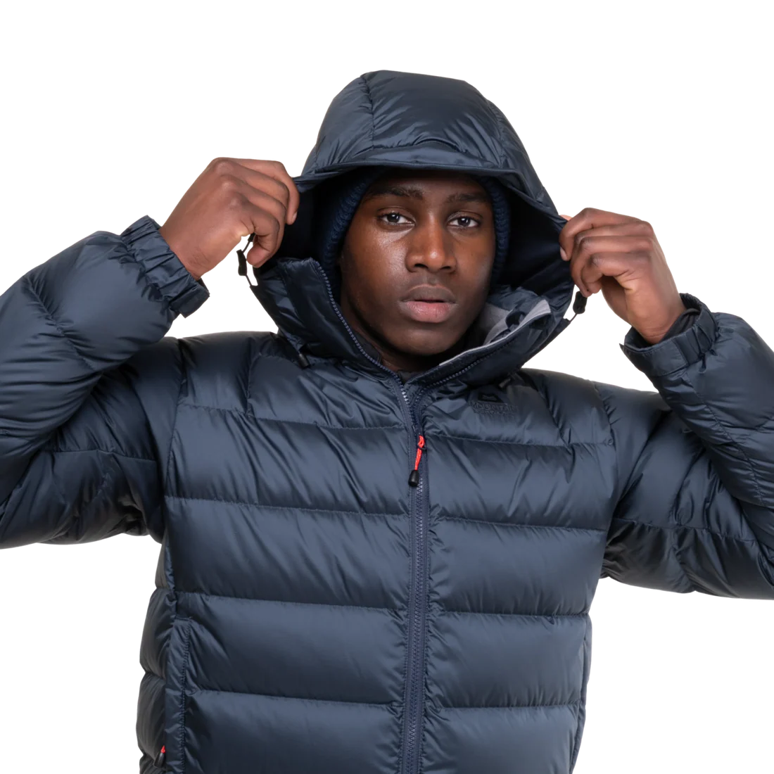 Mountain Equipment Lightline Men's Jacket in Blue Nights/Cosmos - lifestyle view showing technical duvet jacket for mountaineering in sub-zero conditions
