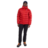 Mountain Equipment Lightline Men's Jacket in Chili Red - lifestyle view showing technical duvet jacket for mountaineering in sub-zero conditions