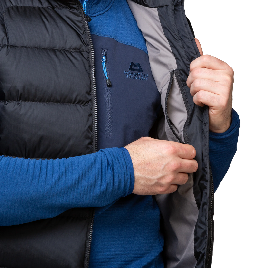 Mountain Equipment Lightline Men's Vest in Black - detail view showing 2-way YKK moulded centre front zip and internal baffle construction