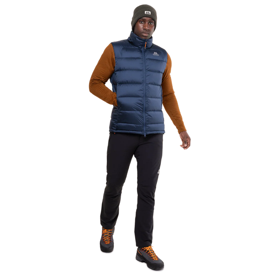 Mountain Equipment Lightline Men's Vest in Navy - detail view showing zipped hand warmer pocket and Drilite Loft windproof outer fabric