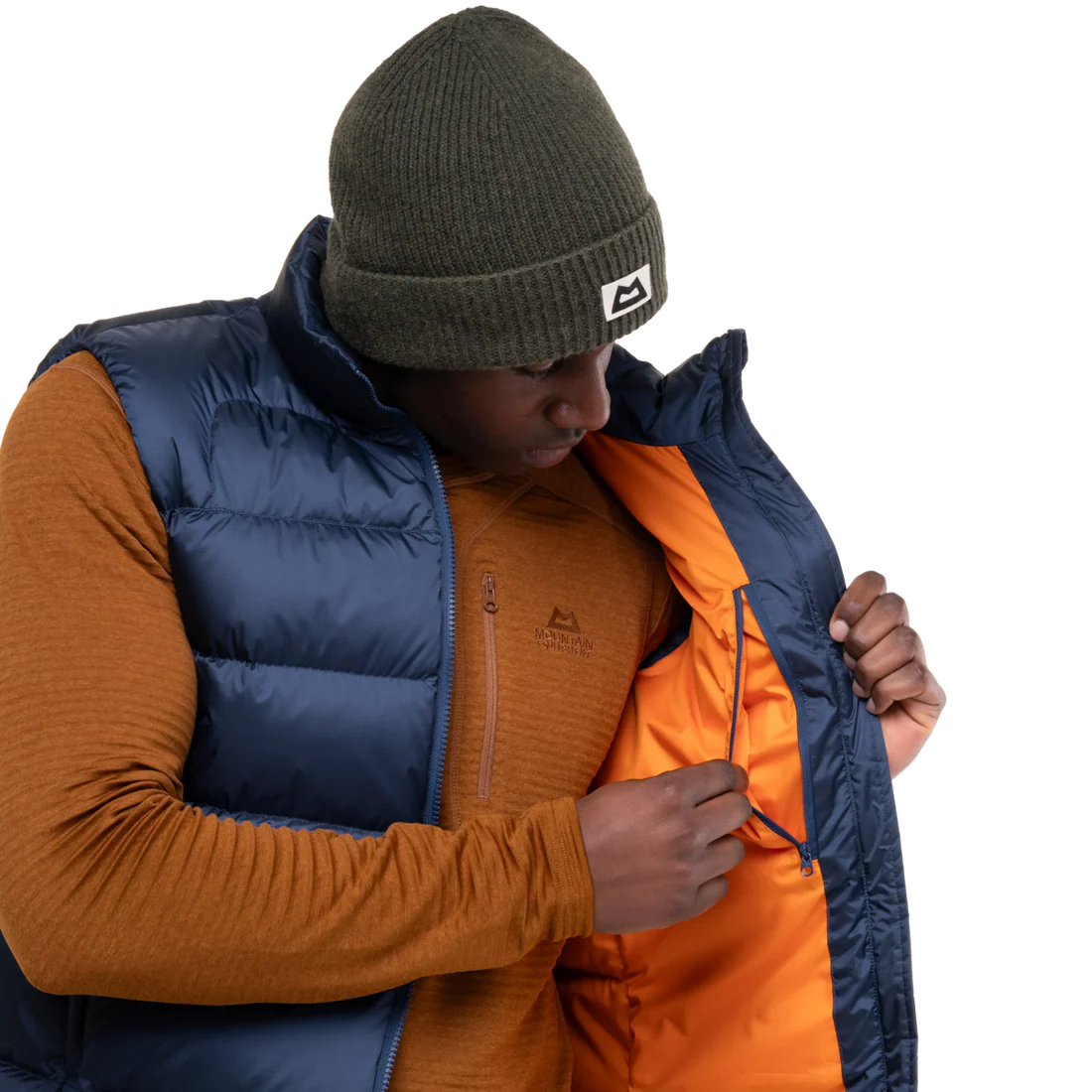 Mountain Equipment Lightline Men's Vest in Navy - detail view showing 2-way YKK moulded centre front zip and internal baffle construction