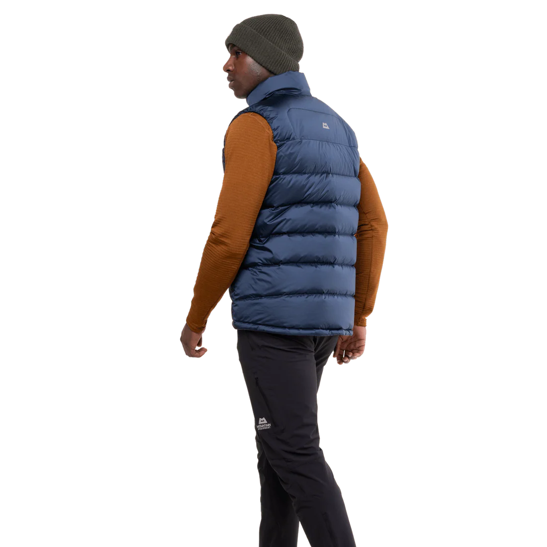 Mountain Equipment Lightline Men's Vest in Navy - detail view showing dual tether hem drawcords and stitch-through baffle construction