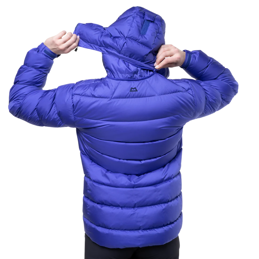 Mountain Equipment Lightline Women's Jacket in Clematis - lifestyle view showing technical duvet jacket for mountaineering in sub-zero conditions