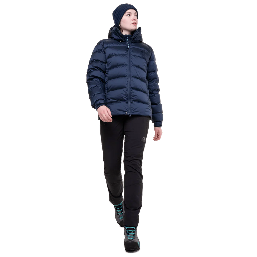Mountain Equipment Lightline Women's Jacket in Cosmos - lifestyle view showing technical duvet jacket for mountaineering in sub-zero conditions
