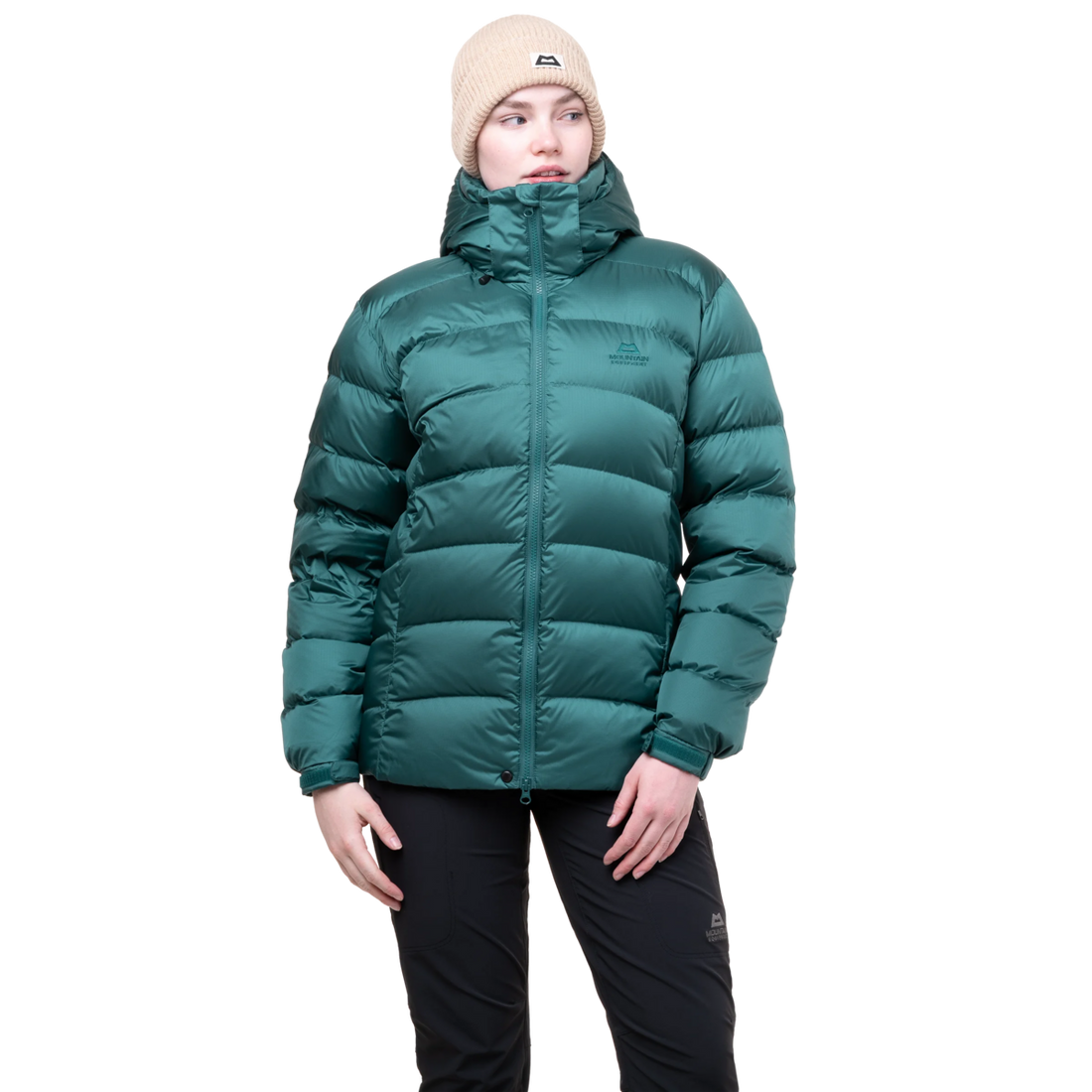Mountain Equipment Lightline Women's Jacket in Deep Teal packed into stuff sack showing lightweight packable construction