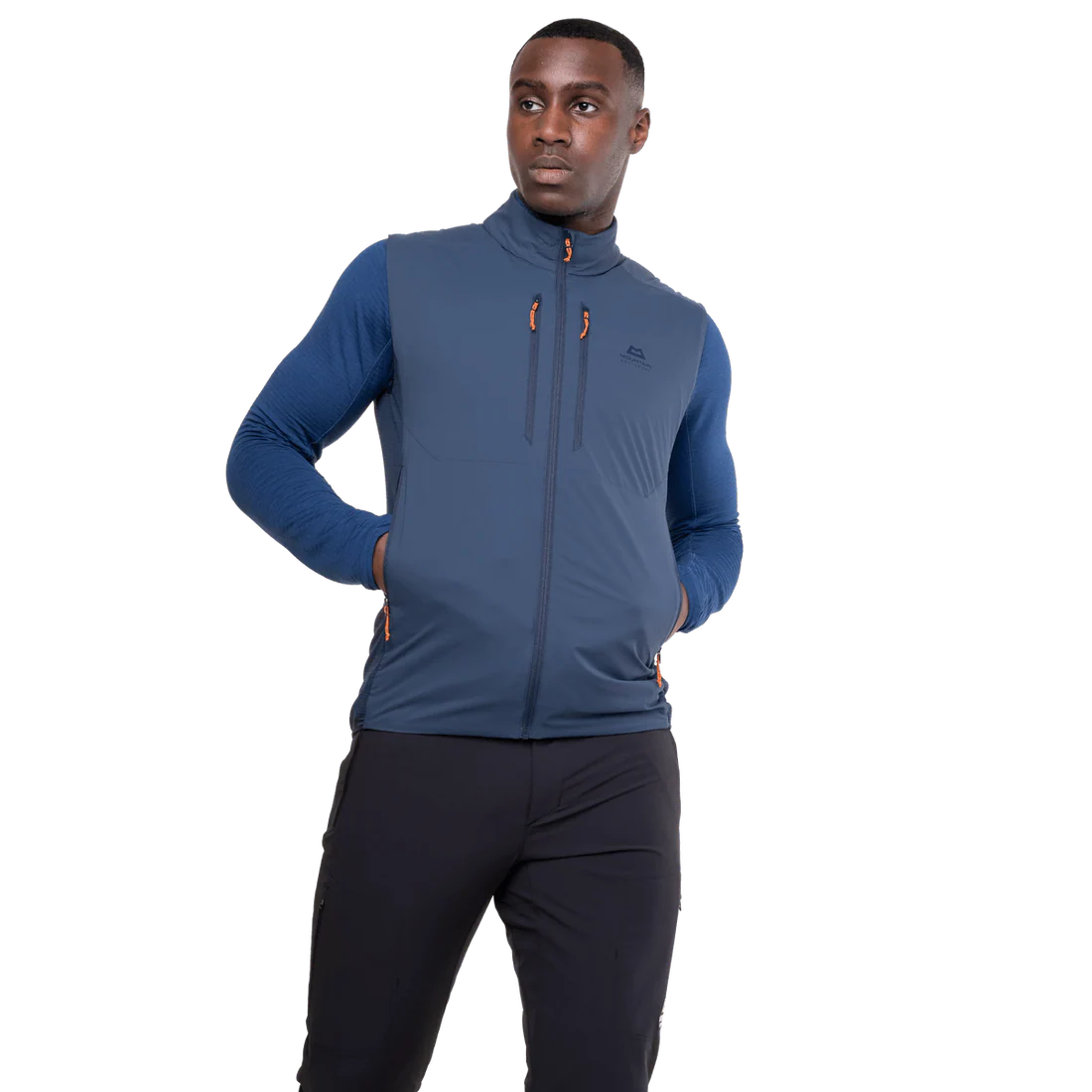 Mountain Equipment Switch Men's Vest in Dusk/Cosmos - detail view showing zipped hand pocket positioned for use with a harness or rucksack waistbelt