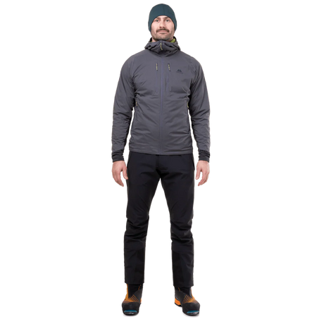 Mountain Equipment Switch Pro Hooded Men's Jacket in Anvil Grey packed into hand pocket showing lightweight packable construction with twin carabiner carry loops