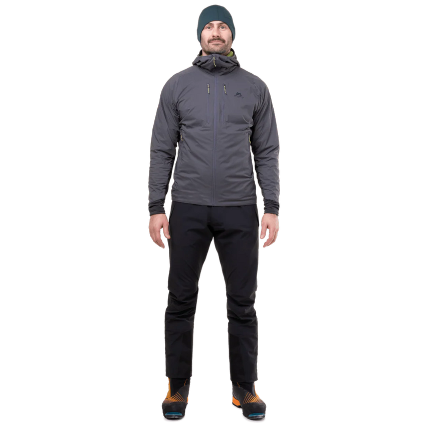 Mountain Equipment Switch Pro Hooded Men's Jacket in Anvil Grey packed into hand pocket showing lightweight packable construction with twin carabiner carry loops