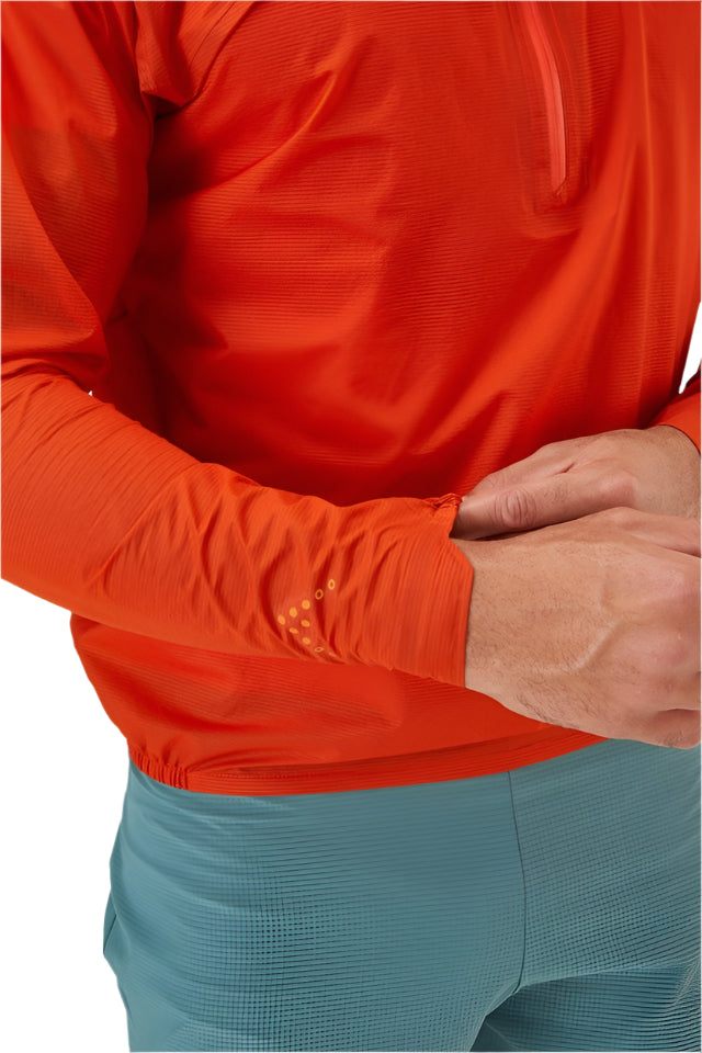 Rab Men's Phantom Waterproof Pull-On Jacket in Firecracker (Reference) - worn, hem detail