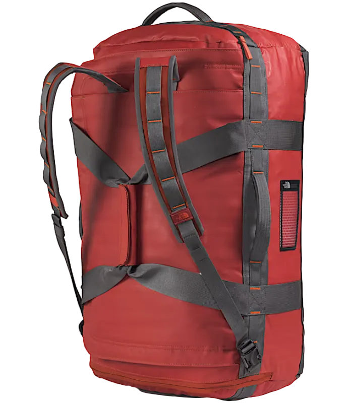 The North Face Base Camp Voyager Duffel 62L Iron Clay/Anthracite Grey/Lava Red - back panel view showing stowable backpack straps and water-resistant ID window